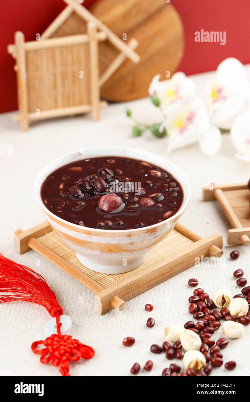 Laba Porridge Eight Treasure Congee, Traditional Chinese Dish Served at Laba or Lantern Festival, Chinese Red Concept Stock Photo
