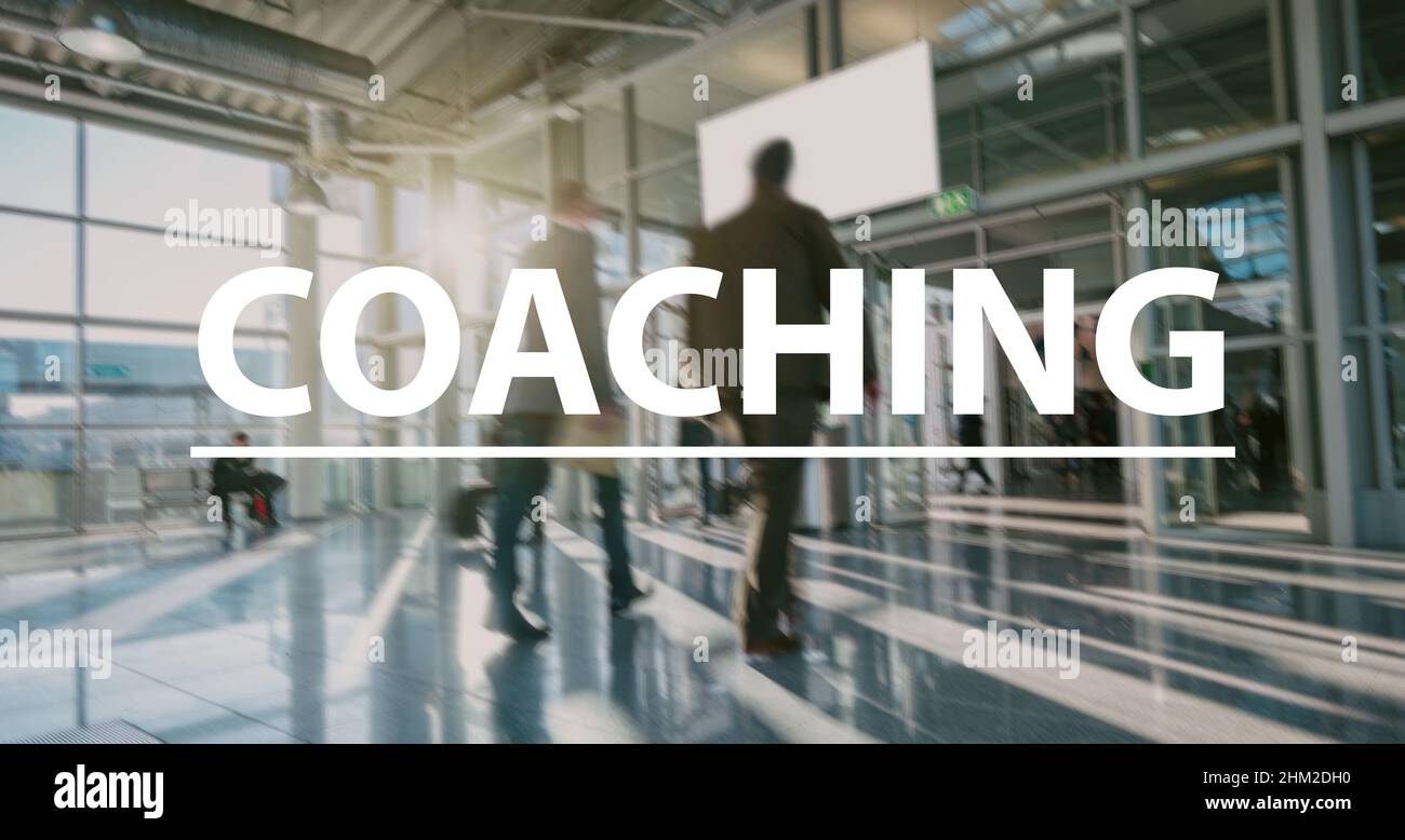 Coaching text Concept image - blurred Business people Stock Photo - Alamy