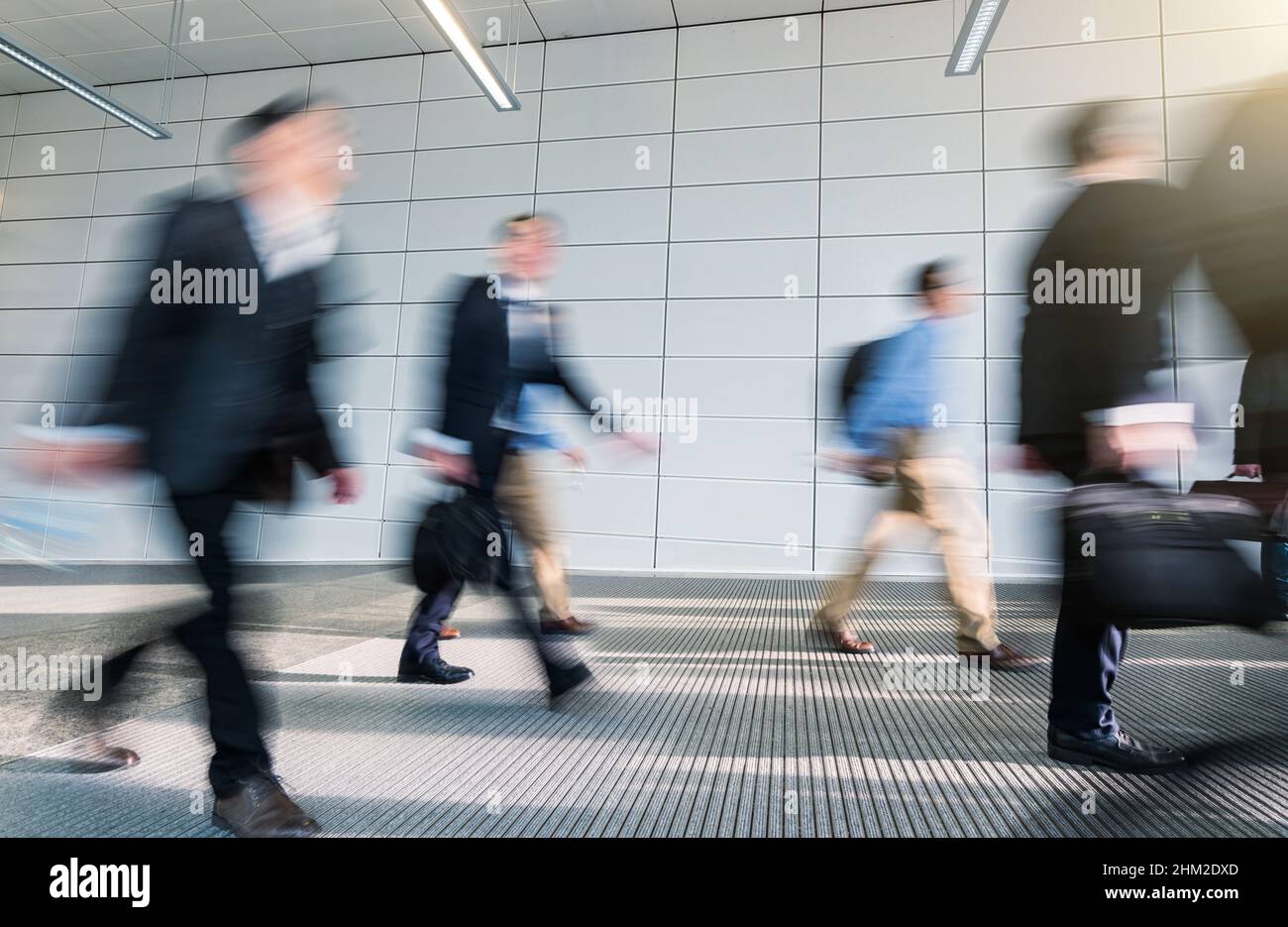 Abstract Image of Business People Walking in a modern office corridor ...