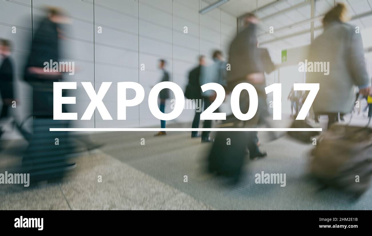 blurred Business people walking on a fair - text Concept image (Expo 2017) Stock Photo