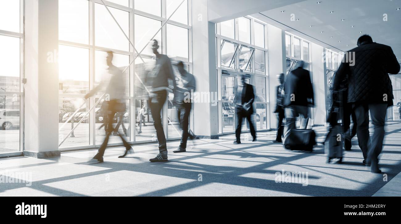 abstakt image of blurred Business people walking in a modern hall Stock ...