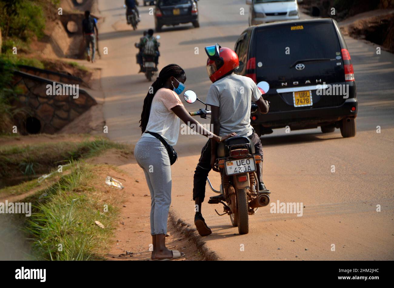 Kampala, Uganda. 6th Feb, 2022. A passenger is seen boarding a