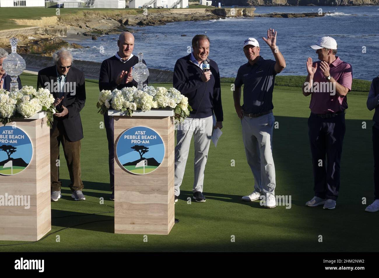 Pebble Beach, USA. 06th Feb, 2022. Tom Hoge waves to the fans alongside