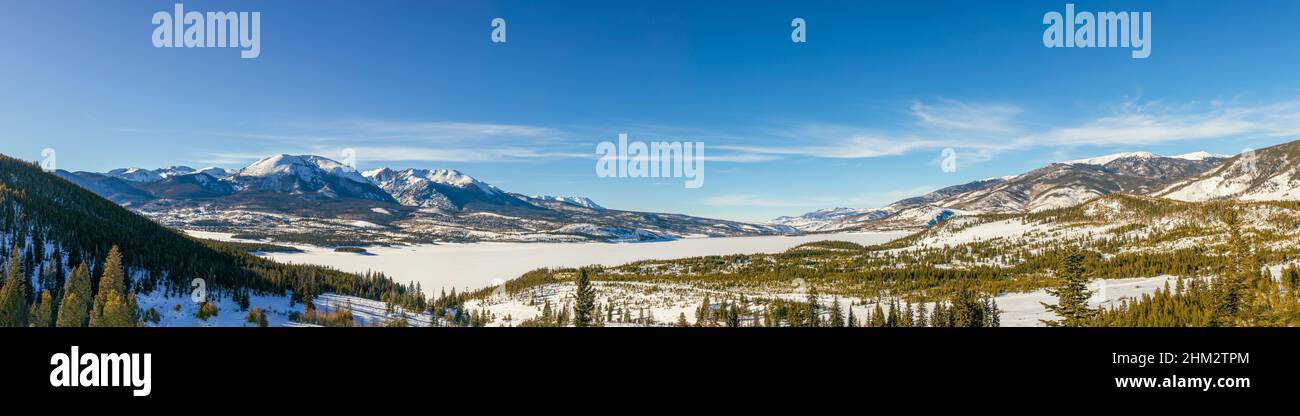 Beautiful winter landscape with evergreen trees and ski tracks in the Rocky Mountains, Colorado, near lake Dillon Stock Photo