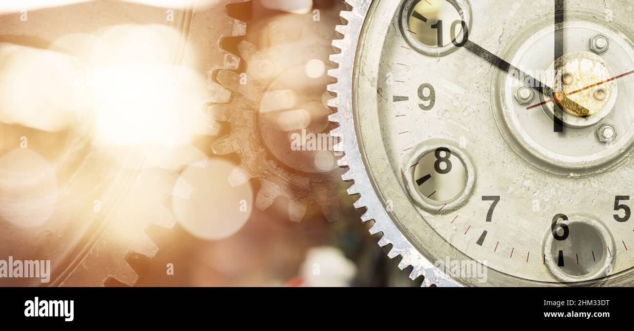 Engineering Heavy Industry Time Clock Cog Wheel Gears work hours concept with space for text Stock Photo