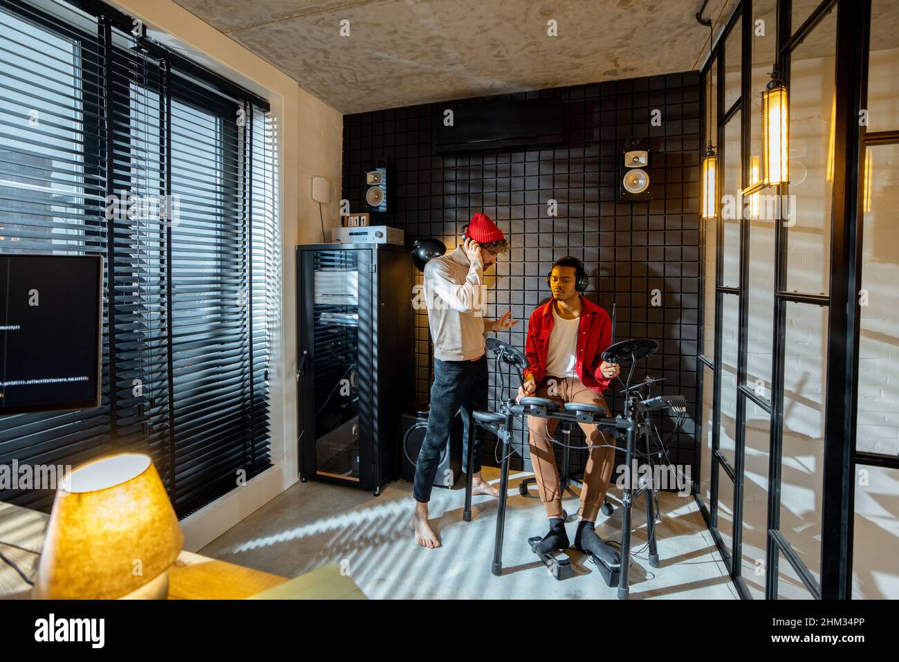 Men playing electric drums at home sstudio Stock Photo