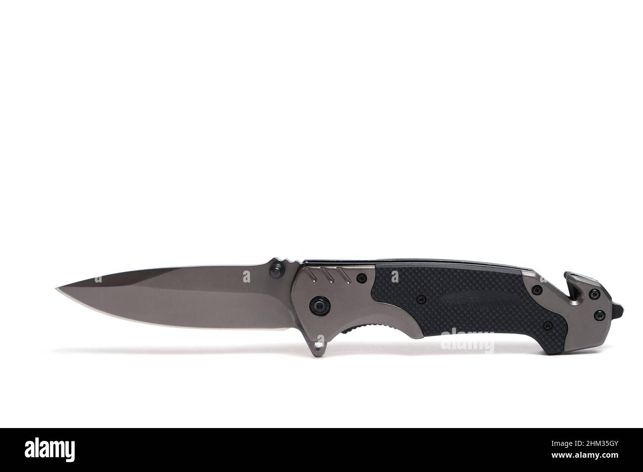 Tactical folding knife on white background, isolated Stock Photo