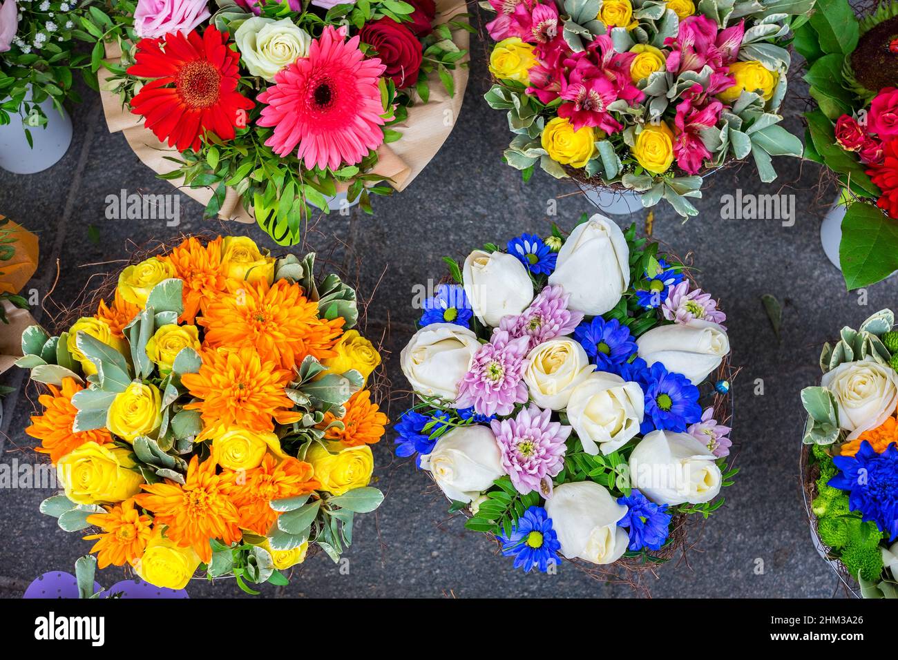 Topview to colourful bouquets of variety flowers at a flower market. Selective focus Stock Photo