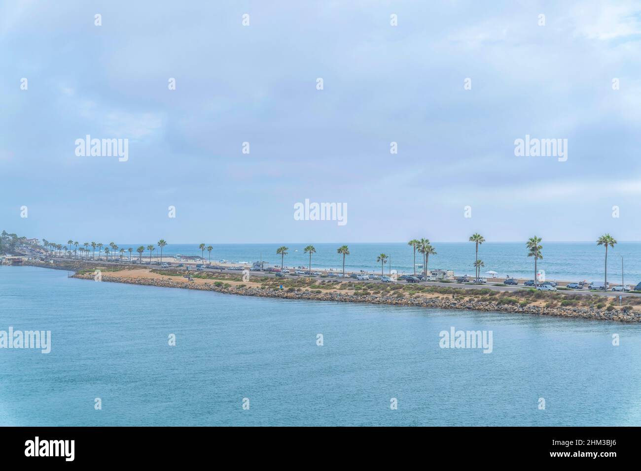 View of Agua Hedionda Lagoon near the beach and road in the middle at ...