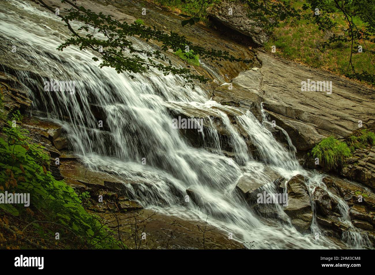 Waterfalls and water slides on the sandstone slabs of the Fosso dell'Acero. Cesacastina, Teramo province, Abruzzo, Italy, Europe. Stock Photo