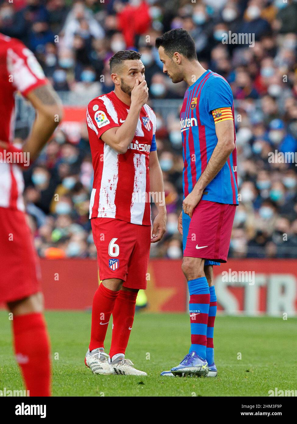 Barcelona, Spain. 06th Feb, 2022. Koke of Atletico de Madrid eith Sergio Busquets of FC Barcelona during the Liga match between FC Barcelona and Atletico de Madrid at Camp Nou in Barcelona, Spain. Credit: DAX Images/Alamy Live News Stock Photo