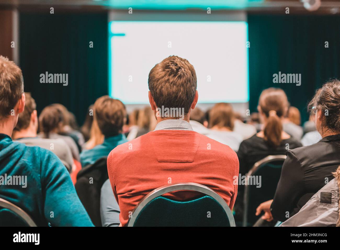 Audience in lecture hall participating at business conference Stock ...