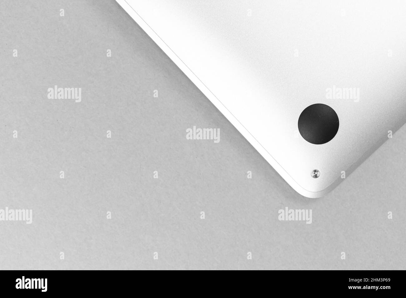 Laptop rubber feet pads. Metal laptop bottom pads closeup view Stock