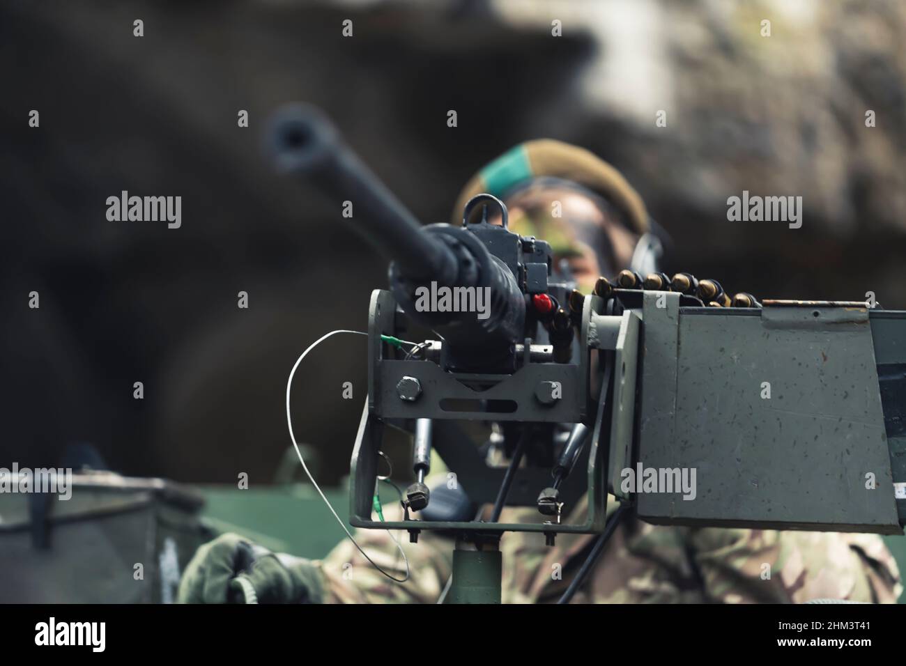 Frightening gun barrel machine firing mode closeup. High quality photo Stock Photo
