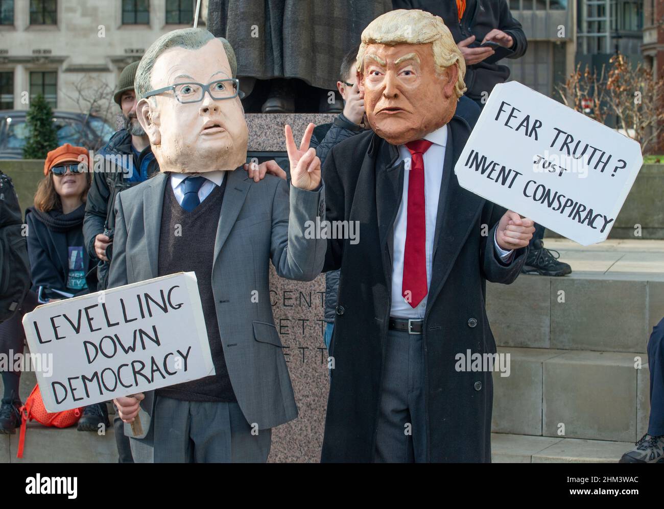 London, UK, 5th February 2022. Protesters dressed as the Secretary of State Michael Gove and former US president Donald Trump at the Make Votes Matter rally, in protest of the Tory government's unfair Elections Bill. The Make Votes Matters movement wants to introduce Proportional Representation to the Houses of Common in Westminster. Stock Photo