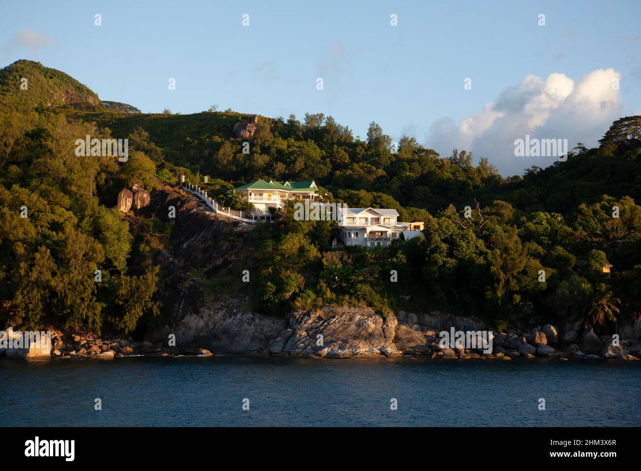 Luxury sea-side homes on the coast of Mahé Island, the main island of Seychelles. Stock Photo