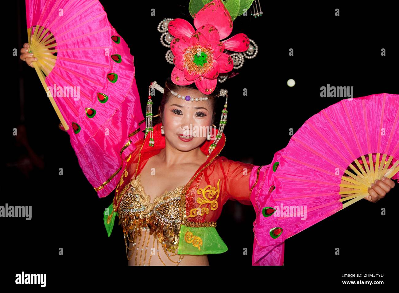 Performer from the Chinese contingent performing at the Seychelles Carnival. Stock Photo