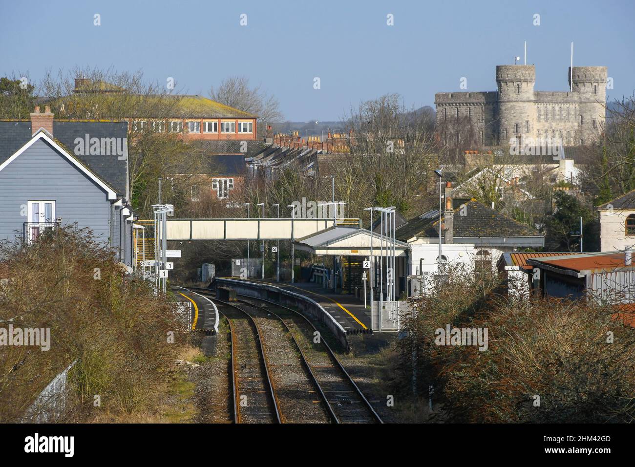 Dorchester, Dorset, UK.  7th February 2022.  UK Weather.  General view of Dorchester West railway station in Dorset with the The Keep Military Museum in the distance on a morning of warm hazy sunshine.  Picture Credit: Graham Hunt/Alamy Live News Stock Photo