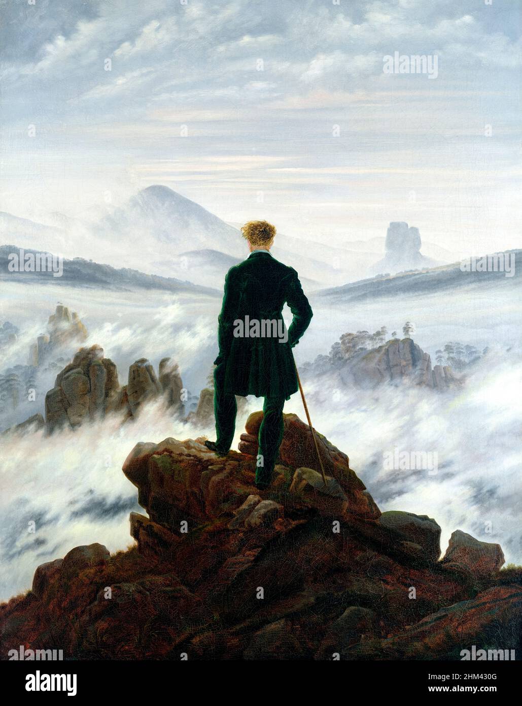 Wanderer above the Sea of Fog [Der Wanderer über dem Nebelmeer] by German painter Caspar David Friedrich (1774-1840) painted circa 1818. Stock Photo