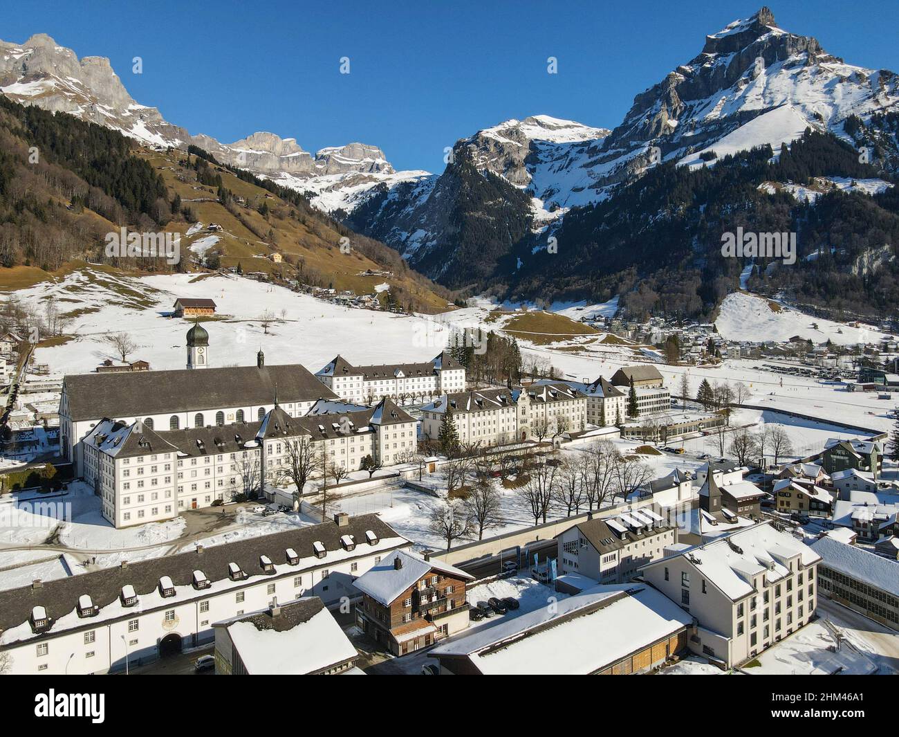 Drone view at the Benedictine convent of Engelberg on the Swiss alps ...