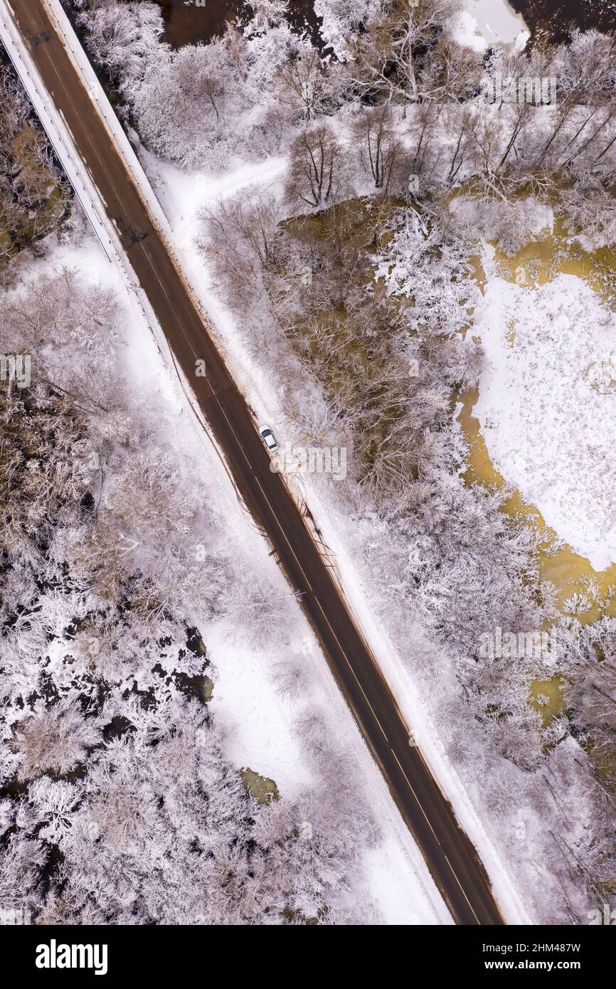 Aerial view on a road through rural winter nature Stock Photo
