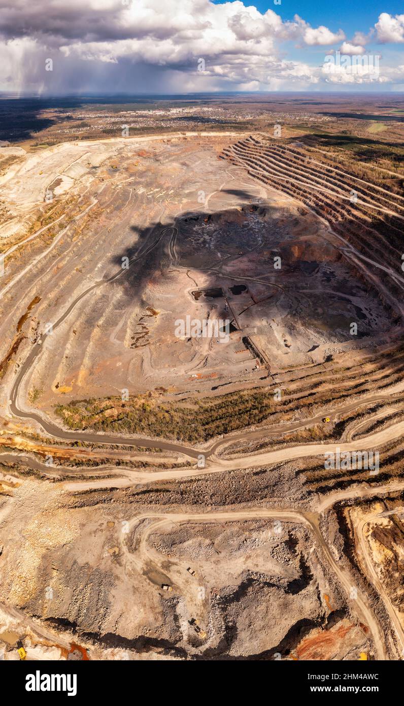 Aerial view on granite quarry. Granite mining from a drone. Stock Photo