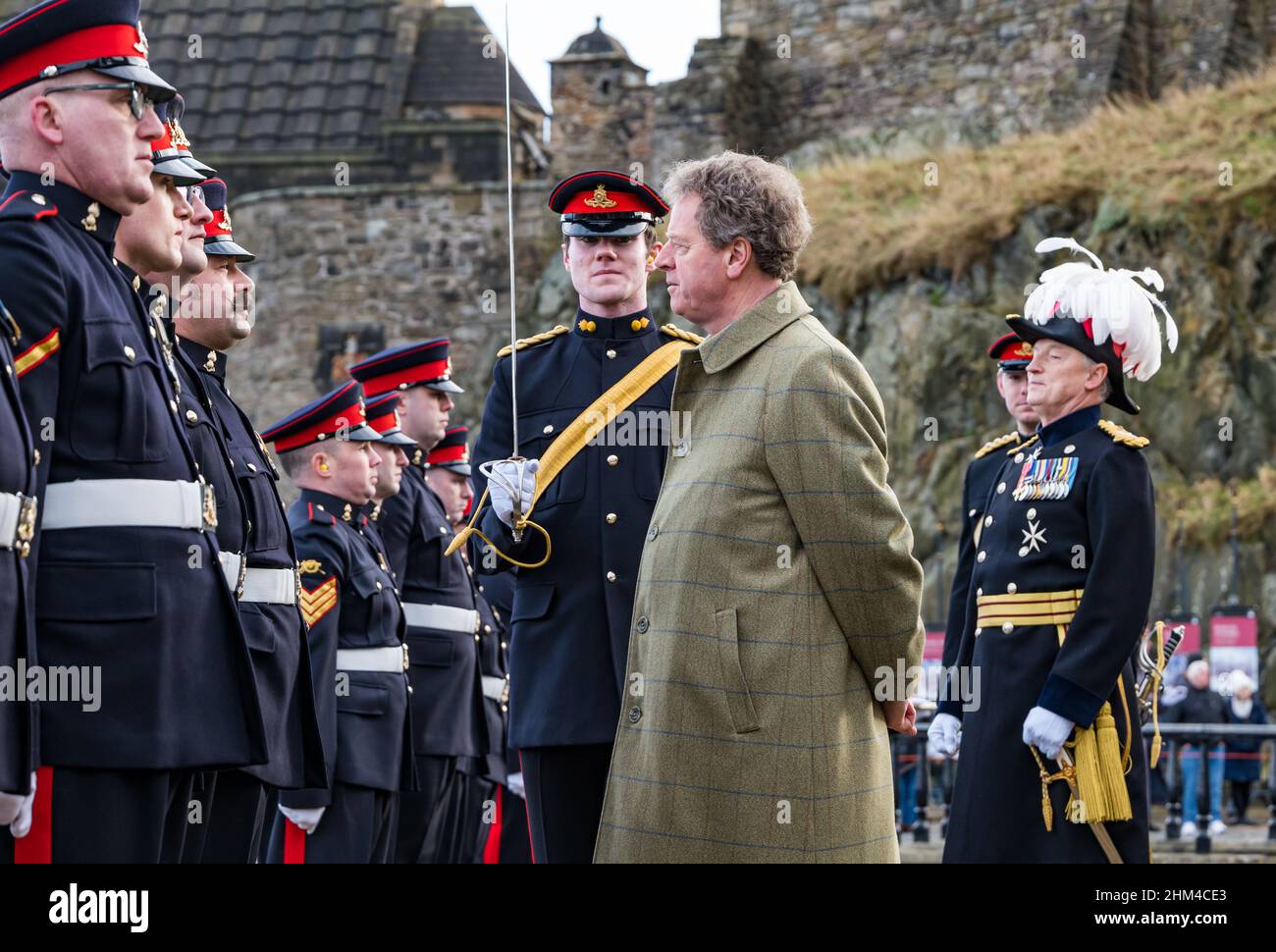 Edinburgh Castle, Edinburgh, Scotland, United Kingdom, 07 February 2022. 21 Gun Salute Accession to the Throne: The salute marks the accession of Queen Elizabeth II to the throne on 6th February 1952, 70 years ago: a platinum Jubilee. The salute is taken by Alister Jack, Secretary of State for Scotland accompanied by the Governor of Edinburgh Castle, Alastair Bruce, with the reservists 105 Regiment Royal Artillery manning the guns Stock Photo