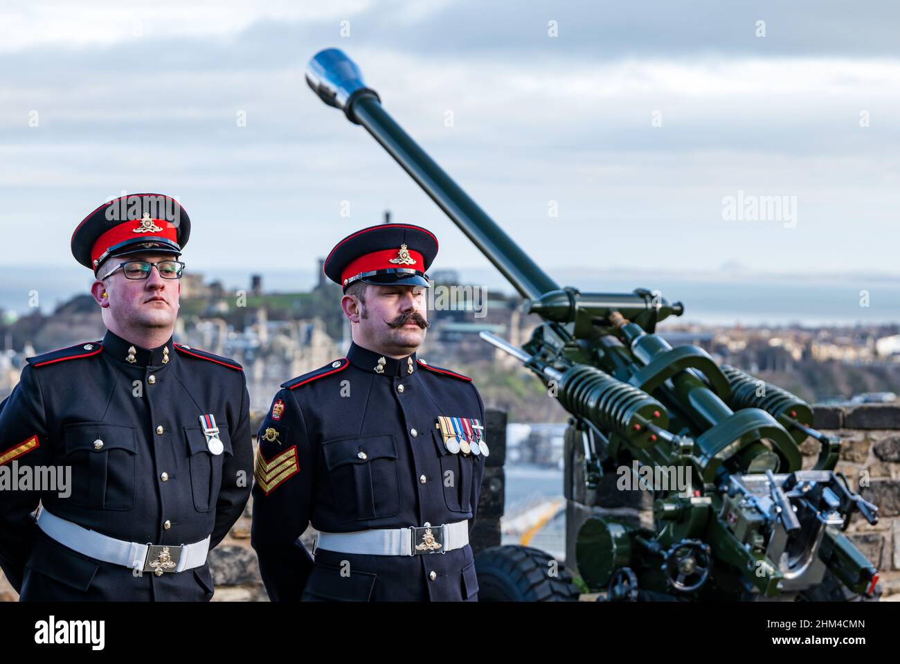 Edinburgh Castle, Edinburgh, Scotland, United Kingdom, 07 February 2022. 21 Gun Salute Accession to the Throne: The salute marks the accession of Queen Elizabeth II to the throne on 6th February 1952, 70 years ago: a platinum Jubilee.  The reservists 105th Regiment Royal Artillery fire the guns Stock Photo