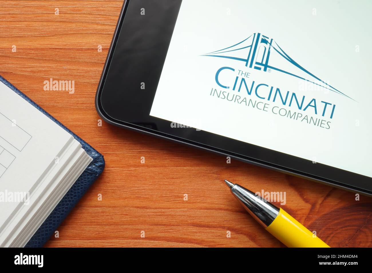 KYIV, UKRAINE - January 27, 2022. The Cincinnati Insurance Companies logo and pen. Stock Photo