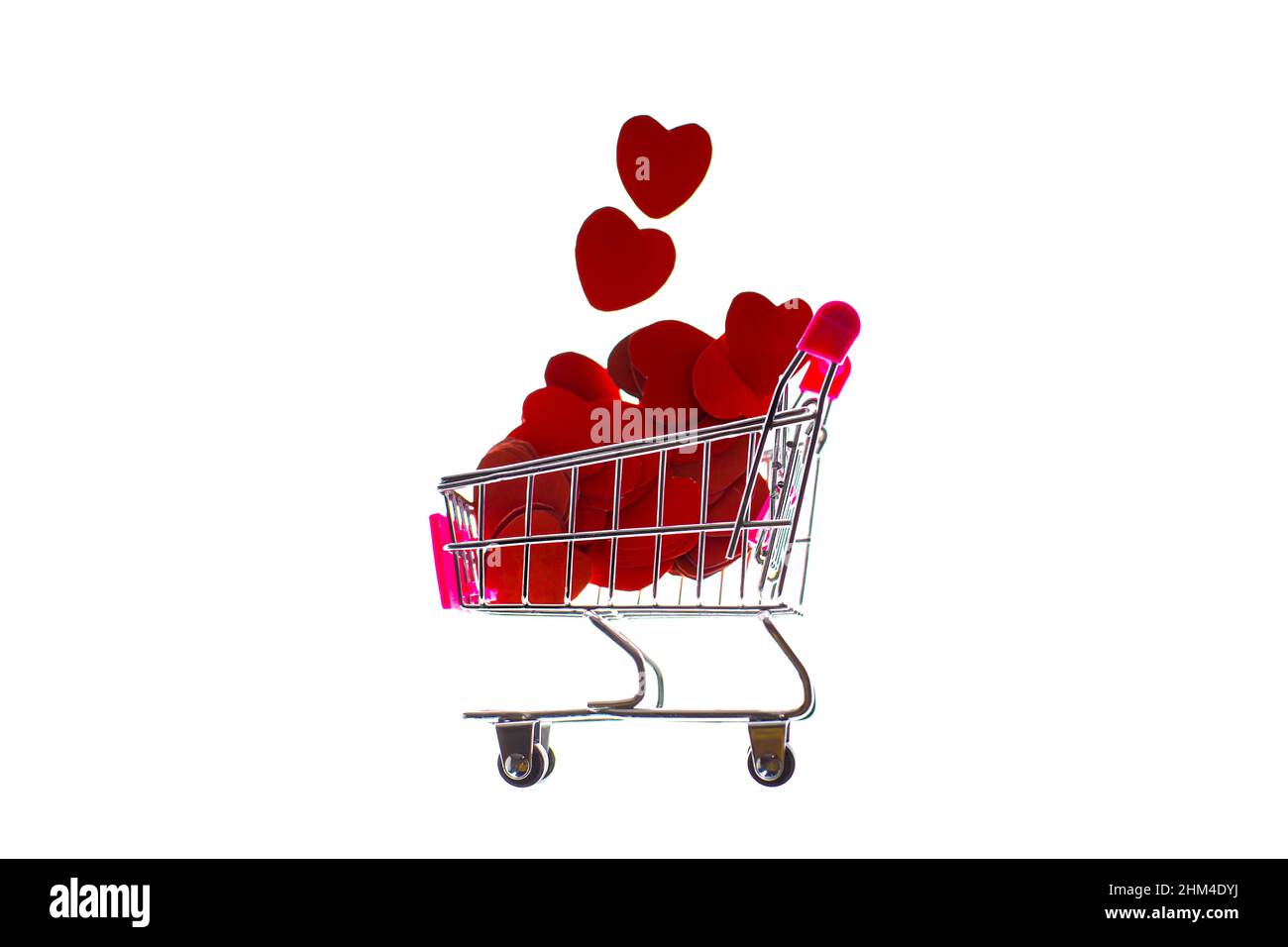 Shopping trolley cart full of red hearts, buy love, social media likes