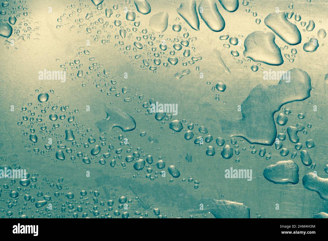 Small Drops Large transparent blue drops hi-res stock photography and images - Alamy