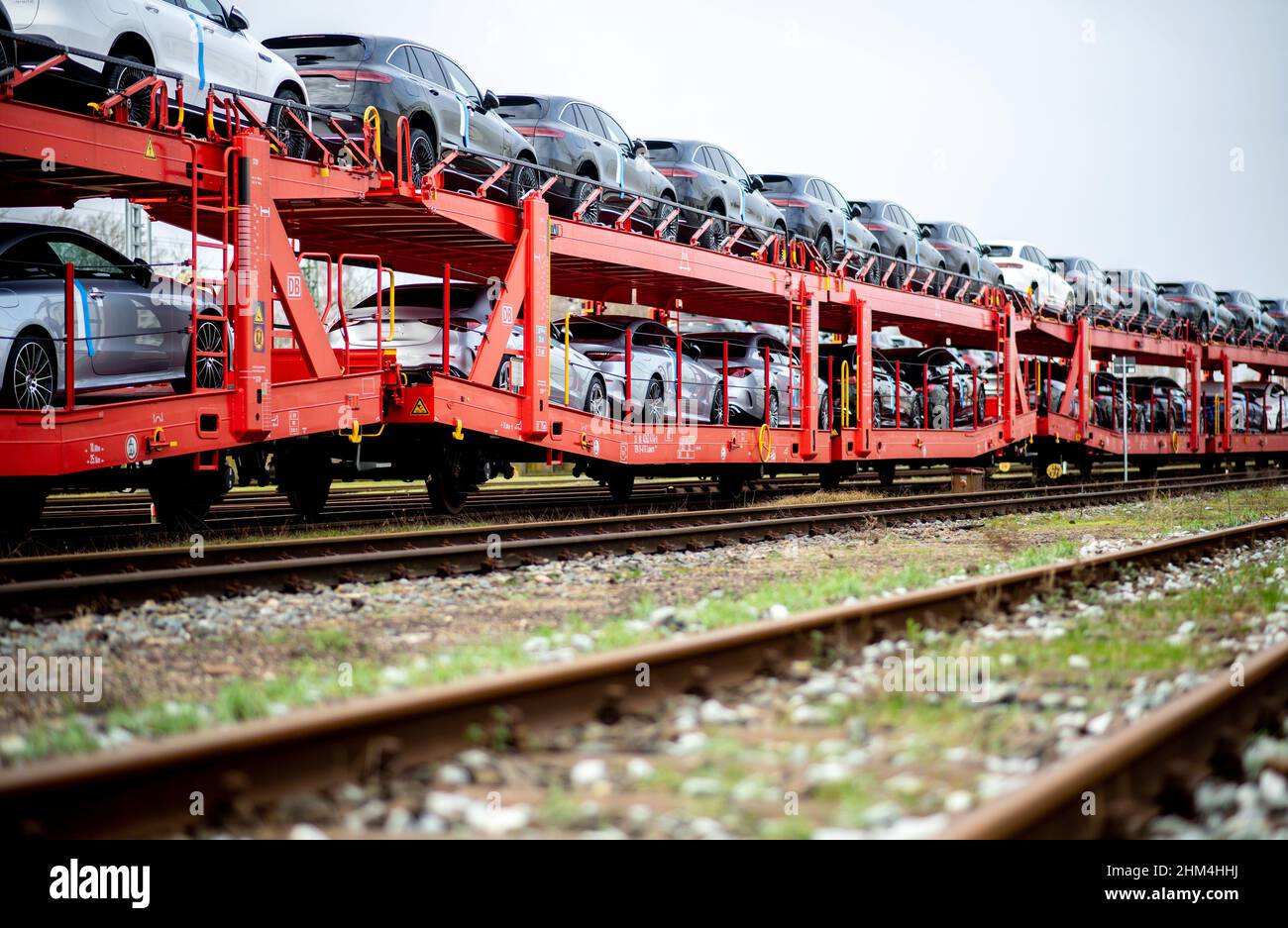 Bremen, Germany. 07th Feb, 2022. Numerous new Mercedes-Benz cars are parked  on several rail wagons at the Automotive Logistics Center Bremen on the DB  Cargo site. The new Automotive Logistics Center on