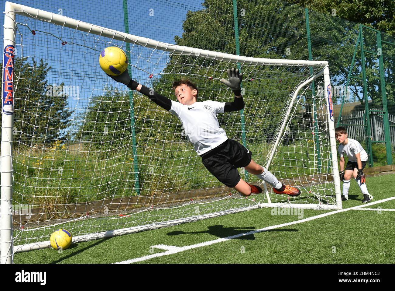 Football training camp for young boys and girls, Yorkshire UK Stock Photo