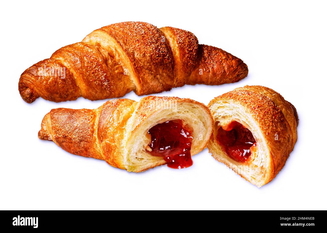 Jam filled croissant on a plate, with a pot of preserve. Placed on a wooden  table top Stock Photo - Alamy