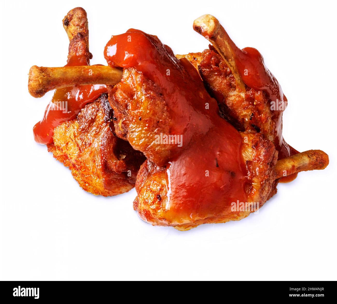 deep fried chicken with red sauce isolated on white. Stock Photo