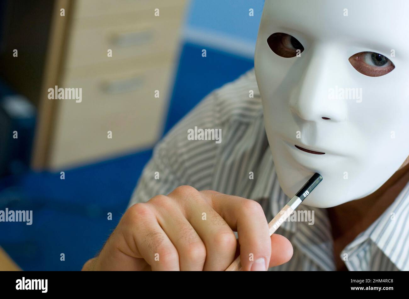 Portrait Of A Man Wearing A Mask And Holding A Pencil, Credit:Photoshot Creative / Stuart Cox / Avalon Stock Photo