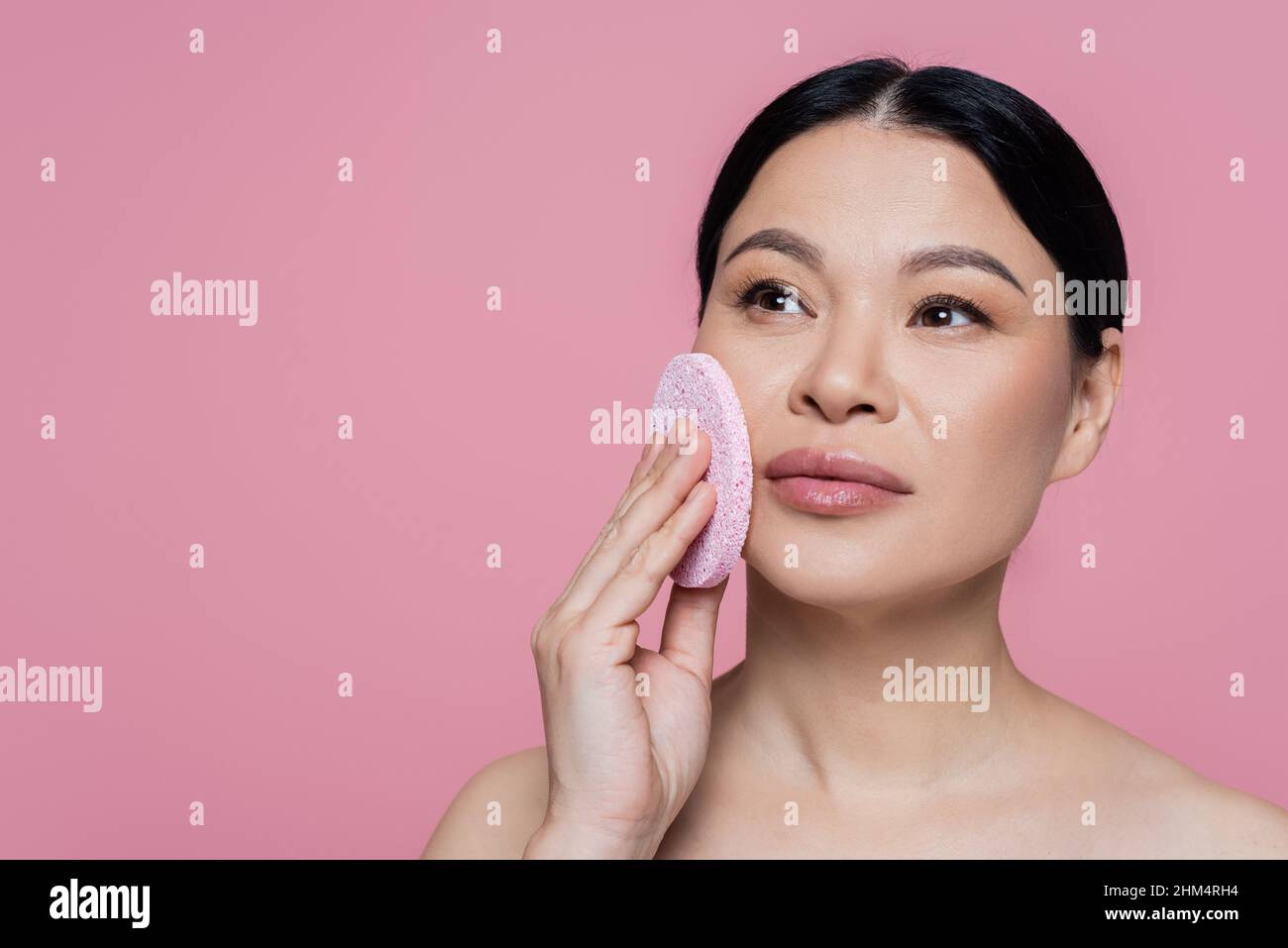 Woman cleaning face hi-res stock photography and images - Alamy