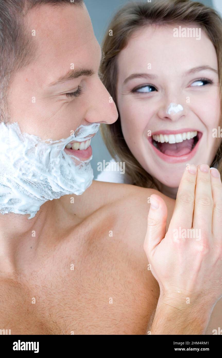 Close-Up Of A Young Man Dabbing Shaving Cream On A Young Woman'S Nose, Credit:Photoshot Creative / Stuart Cox / Avalon Stock Photo