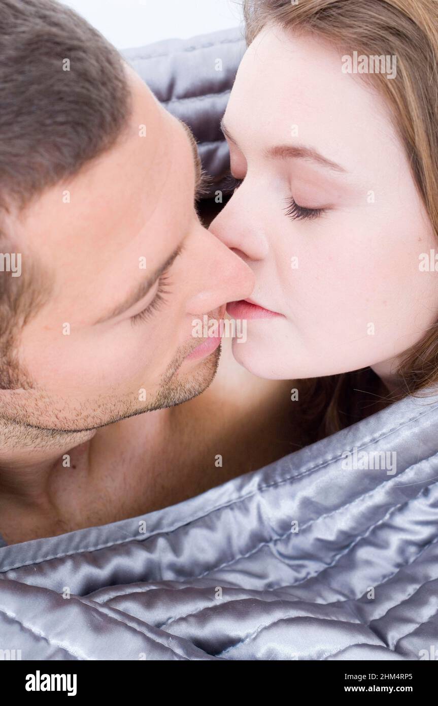 Close-Up Of A Young Couple Kissing Each Other With Their Eyes Closed, Credit:Photoshot Creative / Stuart Cox / Avalon Stock Photo