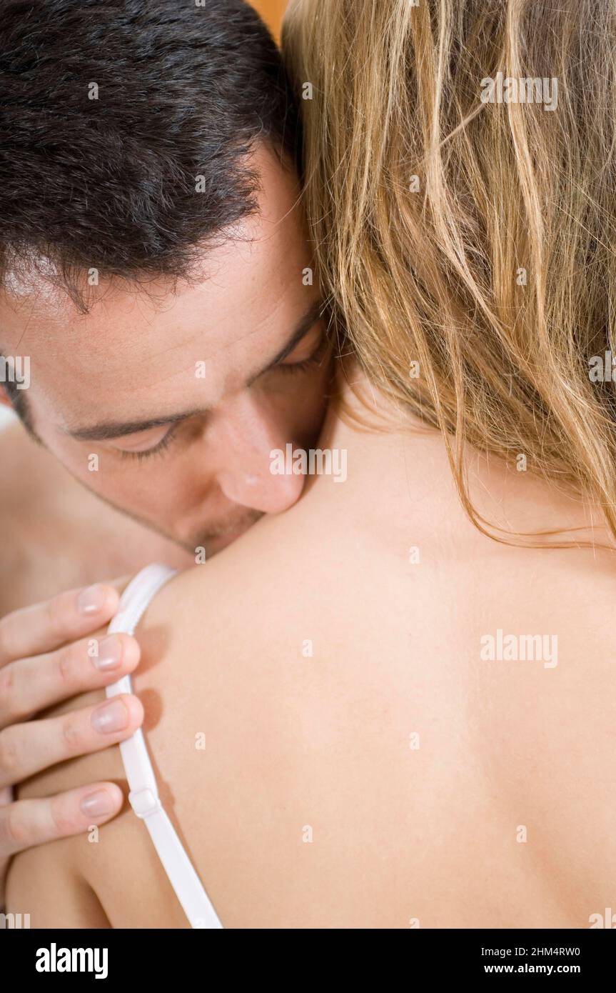 Close-Up Of A Young Man Kissing A Young Woman On Her Neck, Credit:Photoshot Creative / Stuart Cox / Avalon Stock Photo