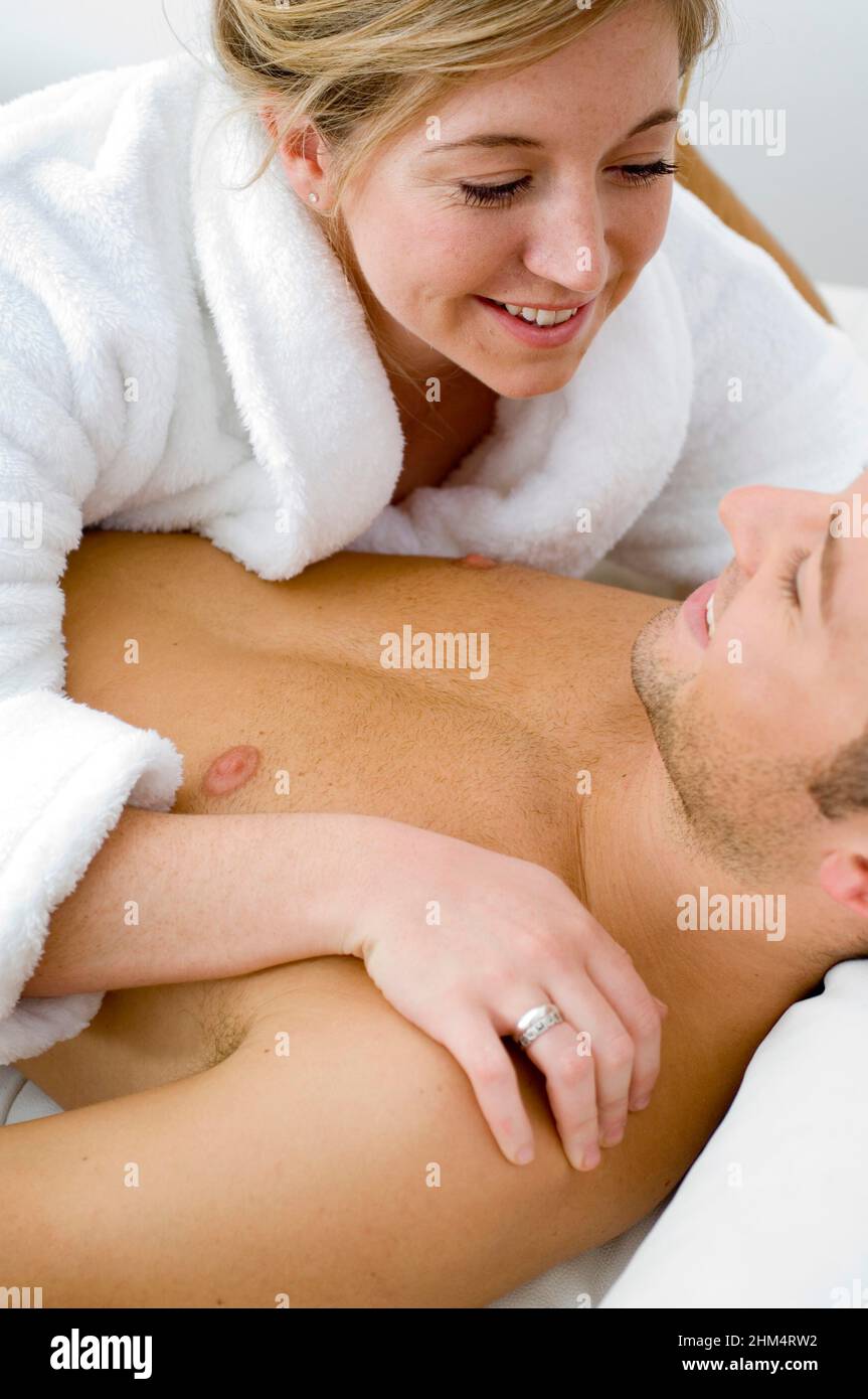 Close-Up Of A Young Couple Laying On The Bed And Looking At Each Other, Credit:Photoshot Creative / Stuart Cox / Avalon Stock Photo