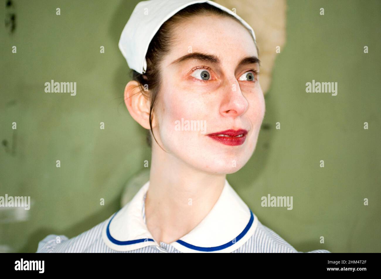 Head Shot Of Stylised Nurse In Uniform, Looking Strange., Credit:Photoshot Creative / Stuart Cox / Avalon Stock Photo