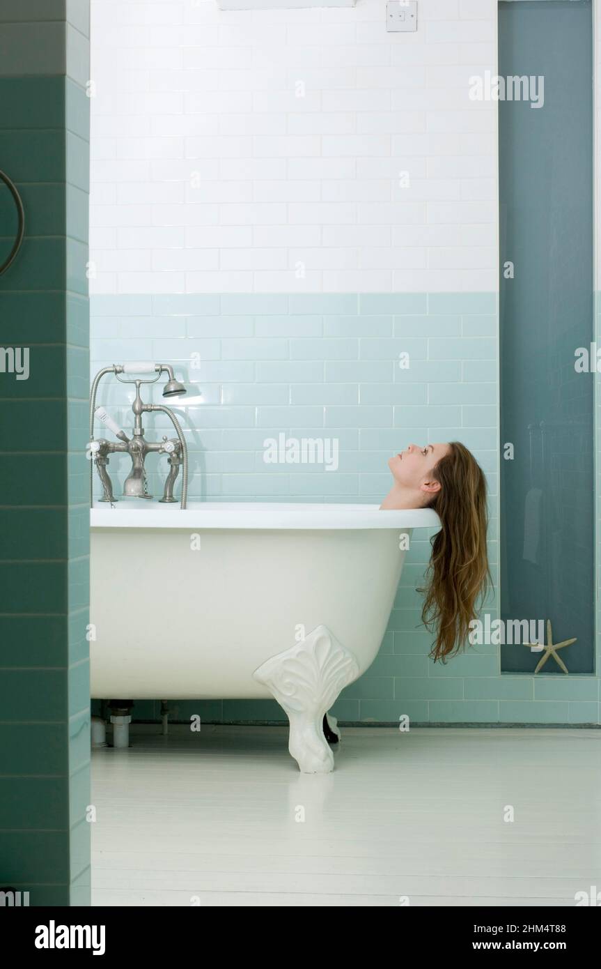 Young Woman In A Bathtub, Credit:Photoshot Creative / Stuart Cox / Avalon Stock Photo