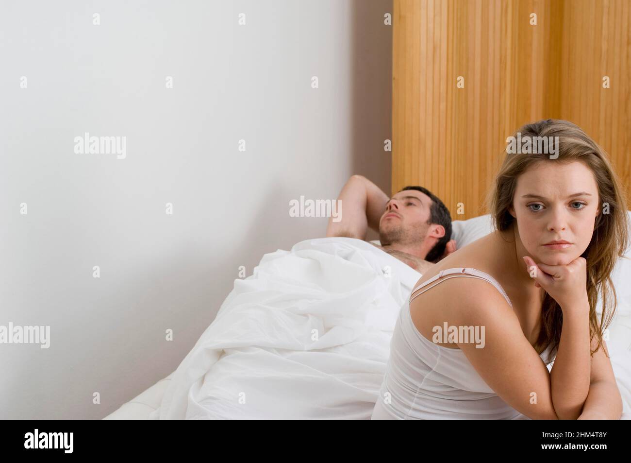 Close-Up Of Young Woman Sitting Beside A Young Man, Credit:Photoshot Creative / Stuart Cox / Avalon Stock Photo