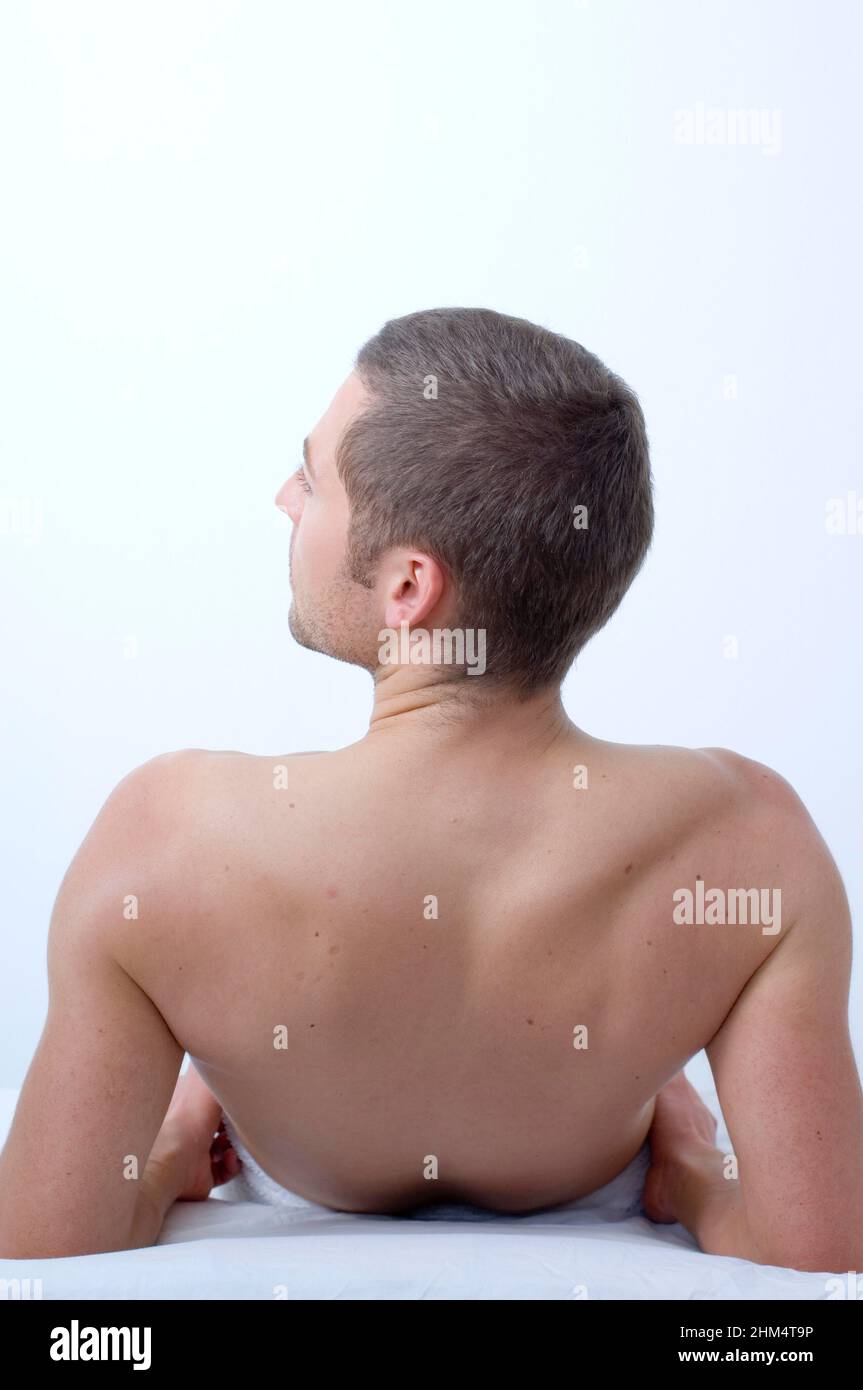 Rear View Of A Young Man Laying On His Back, Credit:Photoshot Creative / Stuart Cox / Avalon Stock Photo