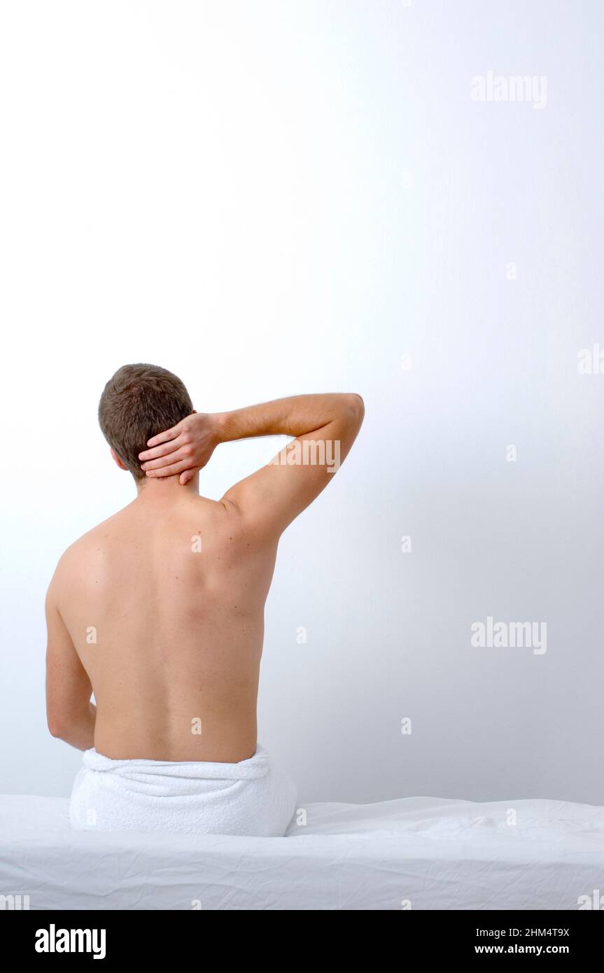 Rear View Of A Man With His Hand On His Head, Credit:Photoshot Creative / Stuart Cox / Avalon Stock Photo