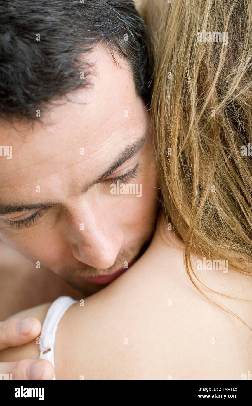 Close-Up Of A Young Couple Embracing Each Other, Credit:Photoshot Creative / Stuart Cox / Avalon Stock Photo