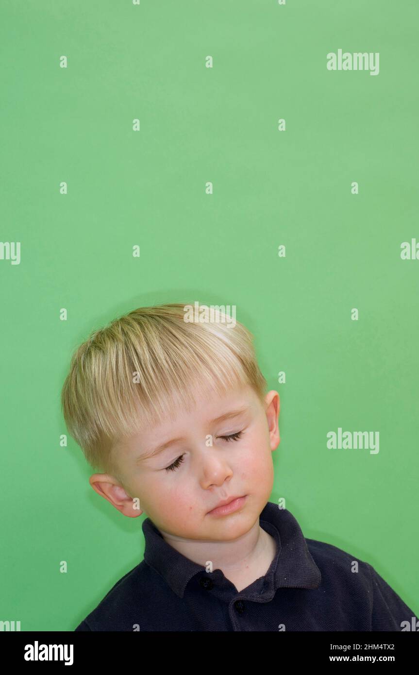 Close-Up Of A Boy With His Eyes Closed, Credit:Photoshot Creative / Stuart Cox / Avalon Stock Photo