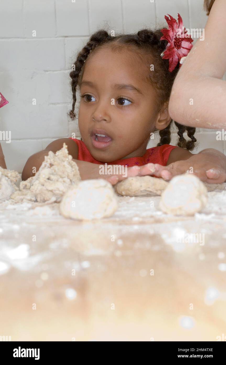 Close-Up Of A Girl Kneading Dough, Credit:Photoshot Creative / Stuart Cox / Avalon Stock Photo