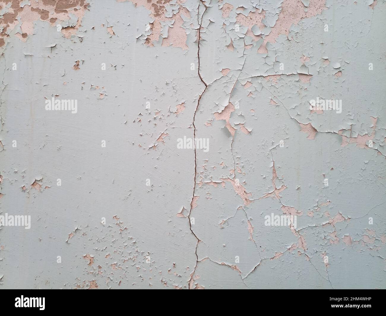 Background texture wall with peeling paint. Peeling old paint off the